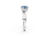 White gold Three-Stone Fancy Blue Round Cut Cut Diamond Ring with Trillion Side Stones on a Split Shank Band_14