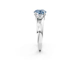 White gold Three-Stone Fancy Blue Round Cut Cut Diamond Ring with Trillion Side Stones on a Split Shank Band_2