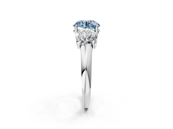 Platinum Three-Stone Fancy Blue Round Cut Diamond Engagement Ring with Prong Setting