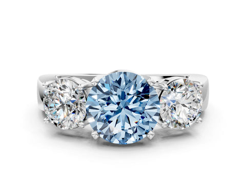 White gold Three-Stone Fancy Blue Round Cut Diamond Ring with Round Side Stones, Classic Band, and Four-Prong Setting
