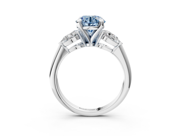 White gold Three-Stone Fancy Blue Round Cut Diamond Ring with Pear Side Stones and Four-Prong Setting