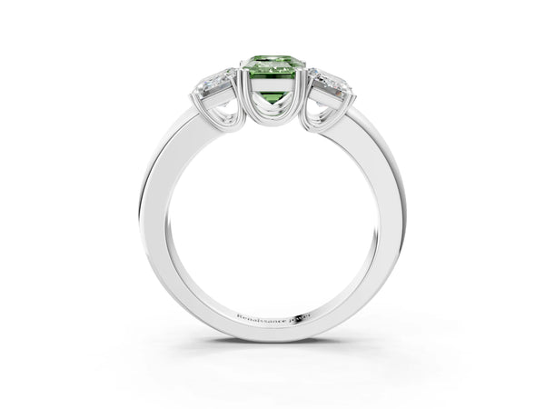 Platinum Three-Stone Fancy Green Emerald Cut Cut Diamond Ring with Channel Set Band and Four-Prong Setting