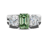 White gold Three-Stone Fancy Green Emerald Cut Diamond Ring with Round Side Stones, Classic Band, and Four-Prong Setting