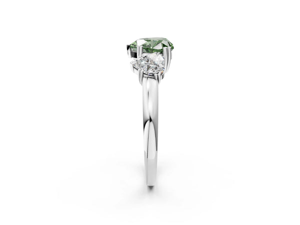 Platinum Three-Stone Fancy Green Heart Cut Cut Diamond Ring with Channel Set Band and Four-Prong Setting