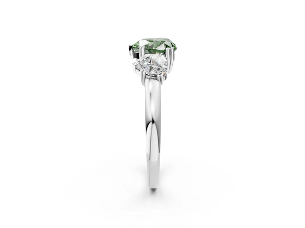 Platinum Three-Stone Fancy Green Heart Cut Cut Diamond Ring with Channel Set Band and Four-Prong Setting