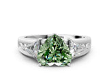 White gold Three-Stone Fancy Green Heart Cut Cut Diamond Ring with Trillion Side Stones on a Split Shank Band