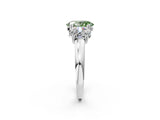 White gold Three-Stone Fancy Green Oval Cut Cut Diamond Ring with Channel Set Band and Four-Prong Setting_26