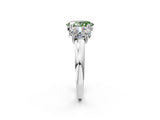 White gold Three-Stone Fancy Green Oval Cut Cut Diamond Ring with Channel Set Band and Four-Prong Setting_50