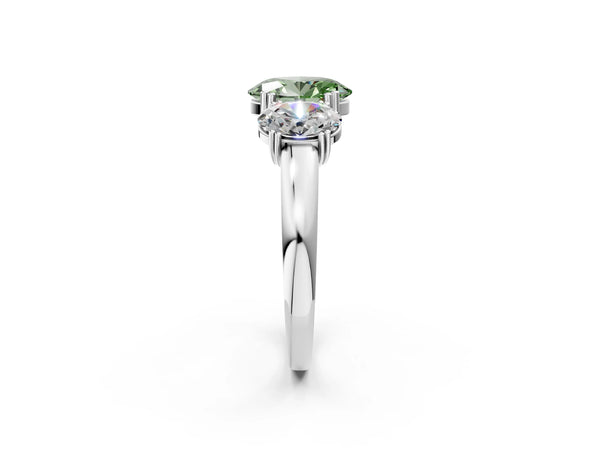 White gold Three-Stone Fancy Green Oval Cut Cut Diamond Ring with Channel Set Band and Four-Prong Setting