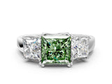 White gold Three-Stone Fancy Green Princess Cut Cut Diamond Ring with Channel Set Band and Four-Prong Setting