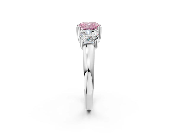 Platinum Three-Stone Fancy Pink Cushion Cut Cut Diamond Ring with Channel Set Band and Four-Prong Setting