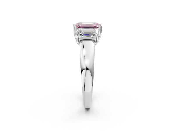 Platinum Three-Stone Fancy Pink Emerald Cut Cut Diamond Ring with Channel Set Band and Four-Prong Setting