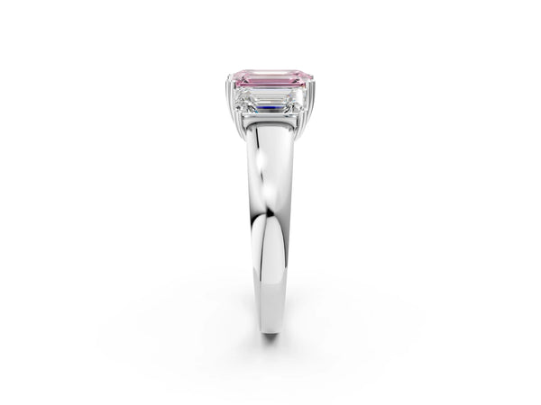 Platinum Three-Stone Fancy Pink Emerald Cut Cut Diamond Ring with Channel Set Band and Four-Prong Setting