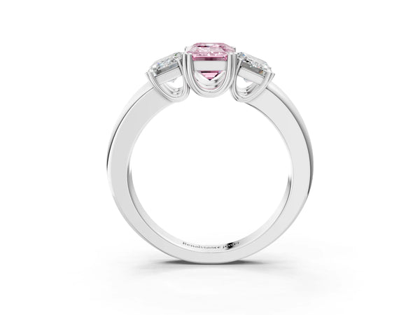 Platinum Three-Stone Fancy Pink Emerald Cut Cut Diamond Ring with Channel Set Band and Four-Prong Setting