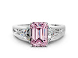 White gold Three-Stone Fancy Pink Emerald Cut Cut Diamond Ring with Trillion Side Stones on a Split Shank Band