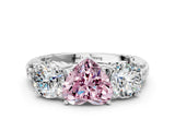 White gold Three-Stone Fancy Pink Heart Cut Cut Diamond Ring with Channel-Set Band and Prong Setting