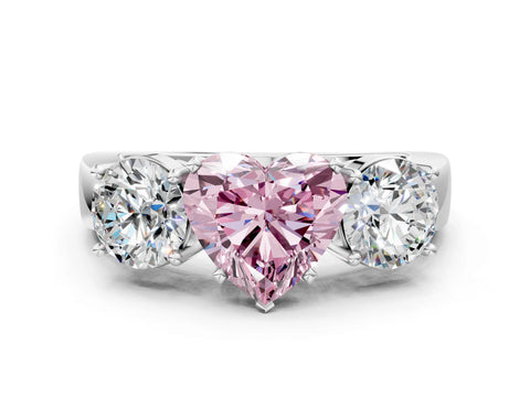 White gold Three-Stone Fancy Pink Heart Cut Diamond Ring with Round Side Stones, Classic Band, and Four-Prong Setting