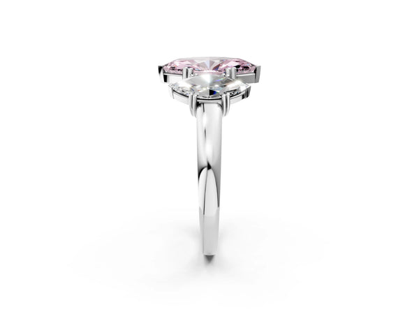 Platinum Three-Stone Fancy Pink Marquise Cut Cut Diamond Ring with Channel Set Band and Four-Prong Setting
