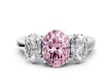 White gold Three-Stone Fancy Pink Oval Cut Cut Diamond Ring with Channel Set Band and Four-Prong Setting_12