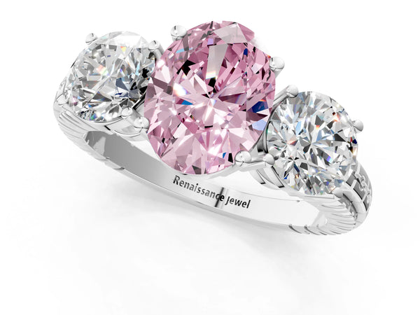 Platinum Three-Stone Fancy Pink Oval Cut Cut Diamond Ring with Channel-Set Band and Prong Setting