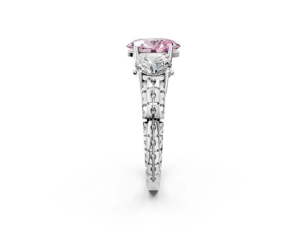 Platinum Three-Stone Fancy Pink Oval Cut Cut Diamond Ring with Channel-Set Band and Prong Setting