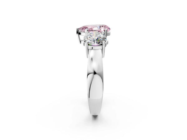 Platinum Three-Stone Fancy Pink Pear Cut Diamond Ring with Round Side Stones, Classic Band, and Four-Prong Setting