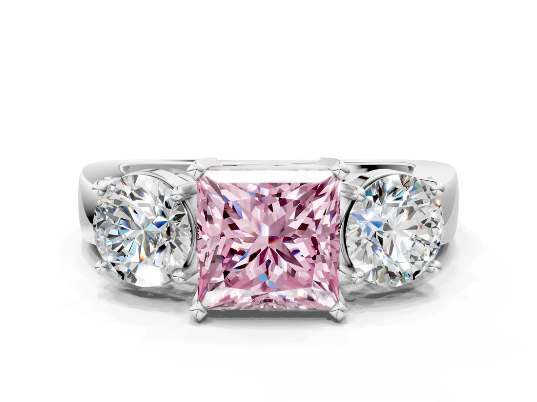 White gold Three-Stone Fancy Pink Princess Cut Diamond Ring with Round Side Stones, Classic Band, and Four-Prong Setting