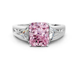 White gold Three-Stone Fancy Pink Radiant Cut Cut Diamond Ring with Trillion Side Stones on a Split Shank Band