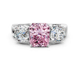 White gold Three-Stone Fancy Pink Radiant Cut Diamond Ring with Round Side Stones, Classic Band, and Four-Prong Setting