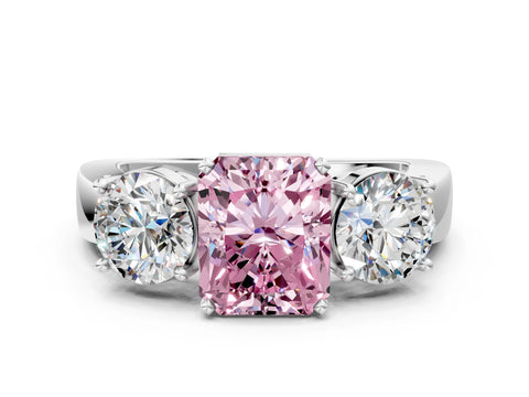 White gold Three-Stone Fancy Pink Radiant Cut Diamond Ring with Round Side Stones, Classic Band, and Four-Prong Setting