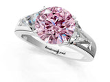 White gold Three-Stone Fancy Pink Round Cut Cut Diamond Ring with Trillion Side Stones on a Split Shank Band_1