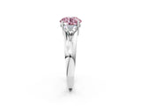 White gold Three-Stone Fancy Pink Round Cut Cut Diamond Ring with Trillion Side Stones on a Split Shank Band_2
