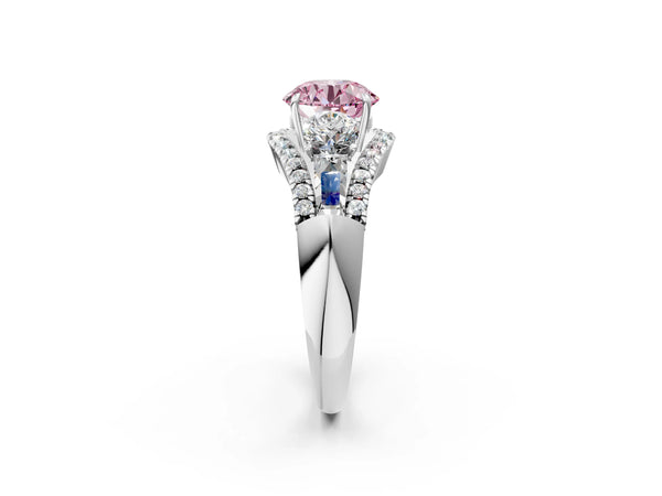 Platinum Three-Stone Fancy Pink Round Cut Diamond Engagement Ring with Pave Band and Prong Setting