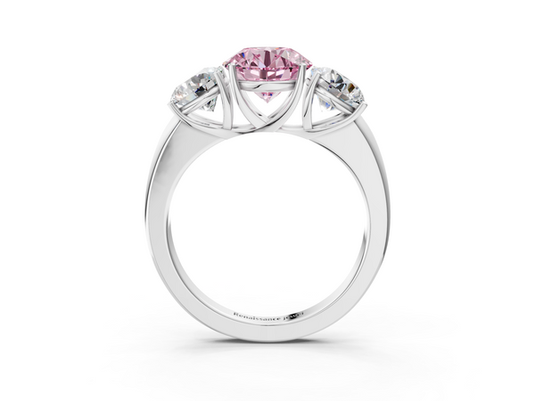 White gold Fancy Pink Round Cut Diamond Three-Stone Ring with Four-Prong Setting and Classic Band