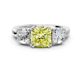 White gold Three-Stone Fancy Yellow Cushion Cut Cut Diamond Ring with Channel Set Band and Four-Prong Setting_12