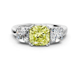White gold Three-Stone Fancy Yellow Cushion Cut Cut Diamond Ring with Channel Set Band and Four-Prong Setting_29