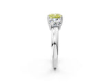 White gold Three-Stone Fancy Yellow Cushion Cut Cut Diamond Ring with Channel Set Band and Four-Prong Setting_39