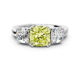 White gold Three-Stone Fancy Yellow Cushion Cut Cut Diamond Ring with Channel Set Band and Four-Prong Setting_5