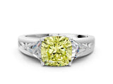 White gold Three-Stone Fancy Yellow Cushion Cut Cut Diamond Ring with Trillion Side Stones on a Split Shank Band