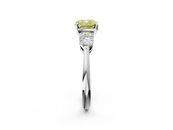 Platinum Three-Stone Fancy Yellow Cushion Cut Diamond Ring with Pear Side Stones and Four-Prong Setting
