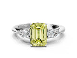 White gold Three-Stone Fancy Yellow Emerald Cut Brilliant Diamond Solitaire Ring with Tapered Band and Four-Prong Setting_31
