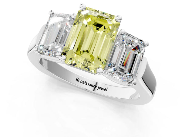 White gold Three-Stone Fancy Yellow Emerald Cut Brilliant Diamond Trellis Ring with Comfort Fit Band
