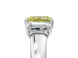 White gold Three-Stone Fancy Yellow Emerald Cut Cut Diamond Ring with Channel Set Band and Four-Prong Setting_17