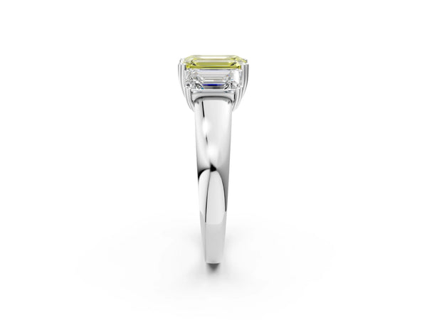Platinum Three-Stone Fancy Yellow Emerald Cut Cut Diamond Ring with Channel Set Band and Four-Prong Setting