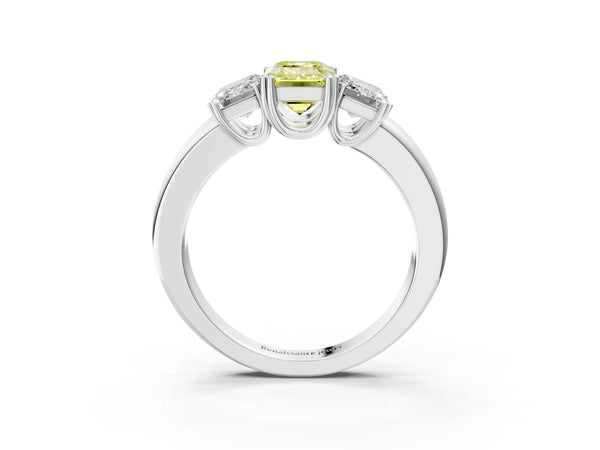 Platinum Three-Stone Fancy Yellow Emerald Cut Cut Diamond Ring with Channel Set Band and Four-Prong Setting