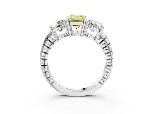 White gold Three-Stone Fancy Yellow Emerald Cut Cut Diamond Ring with Channel-Set Band and Prong Setting