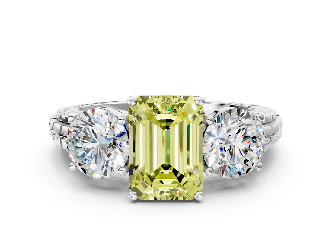 White gold Three-Stone Fancy Yellow Emerald Cut Cut Diamond Ring with Channel-Set Band and Prong Setting