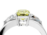 White gold Three-Stone Fancy Yellow Emerald Cut Cut Diamond Ring with Trillion Side Stones on a Split Shank Band_4