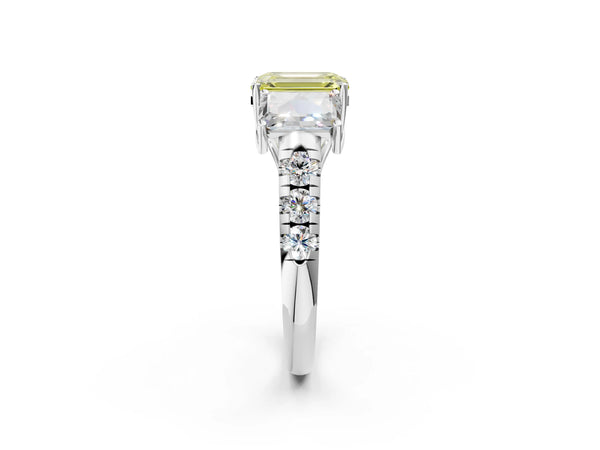 Platinum Three-Stone Fancy Yellow Emerald Cut Diamond Pavé Band with Prong Setting