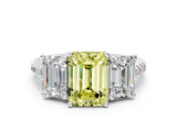 White gold Three-Stone Fancy Yellow Emerald Cut Diamond Ring with Pavé Band and Prong Setting_141